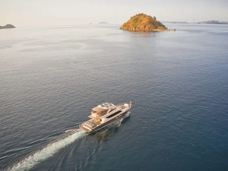 A speedboat crossing open water in Komodo